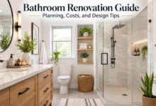 Modern bathroom renovation featuring a wood vanity, quartz countertop, frameless glass walk-in shower, neutral tile walls, and contemporary fixtures in a bright, spa-inspired design.